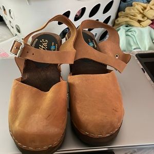 Brand new never been worn wooden handmade clogs.  Size 37 women